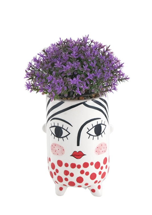 Pop girl pot with white dress and red polka dots with lavender seedling